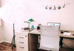 Tidy home work area with a computer, ready to work online from home and get paid