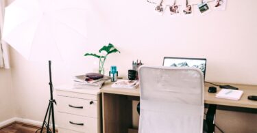 Tidy home work area with a computer, ready to work online from home and get paid