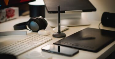 Graphic designer working in a home office studio, using a skill to make money from home online