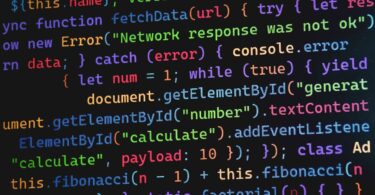 Colorful JavaScript code displayed on a screen, as written in an online JavaScript editor
