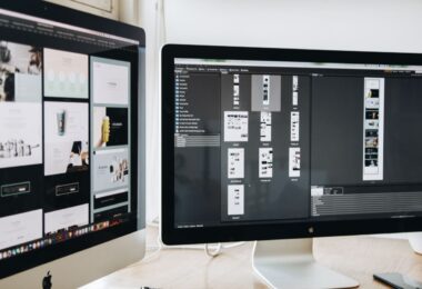 Dual monitors displaying website design projects, made simple with the best website builder