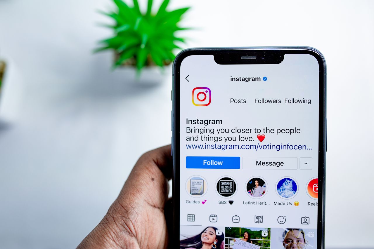 Close-up of a smartphone showing the Instagram app, where the most followed accounts post to millions of fans