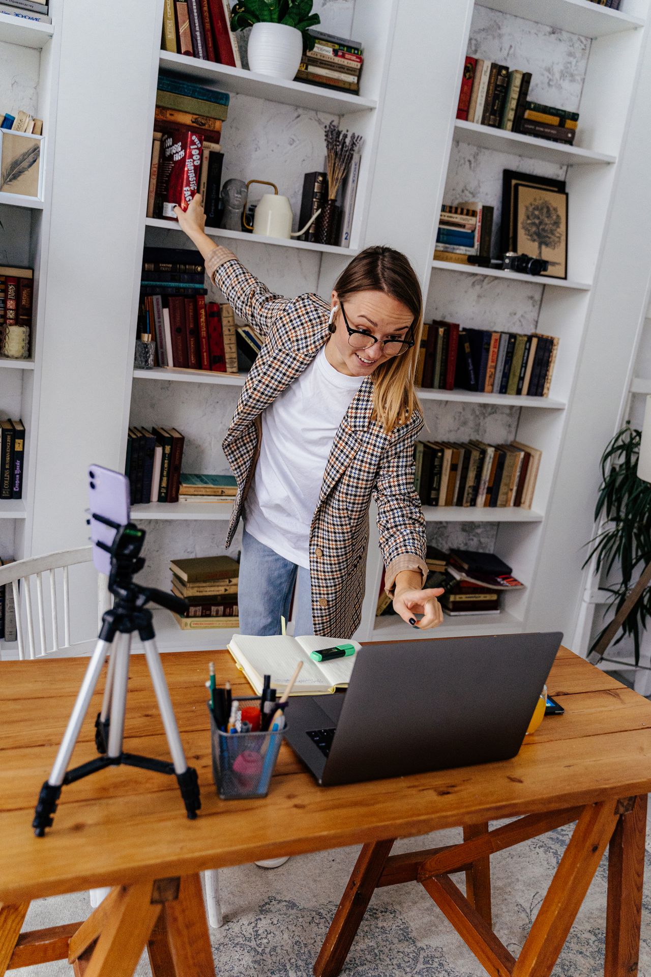 Tutor teaching an online class from home, a scheduled remote job that suits students