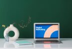 Laptop on a desk showing digital marketing, ready to learn how to use AWeber for email campaigns