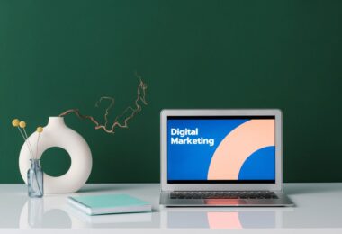 Laptop on a desk showing digital marketing, ready to learn how to use AWeber for email campaigns