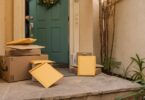 Delivery parcels stacked at a front door, the first place to check when asking USPS where's my package