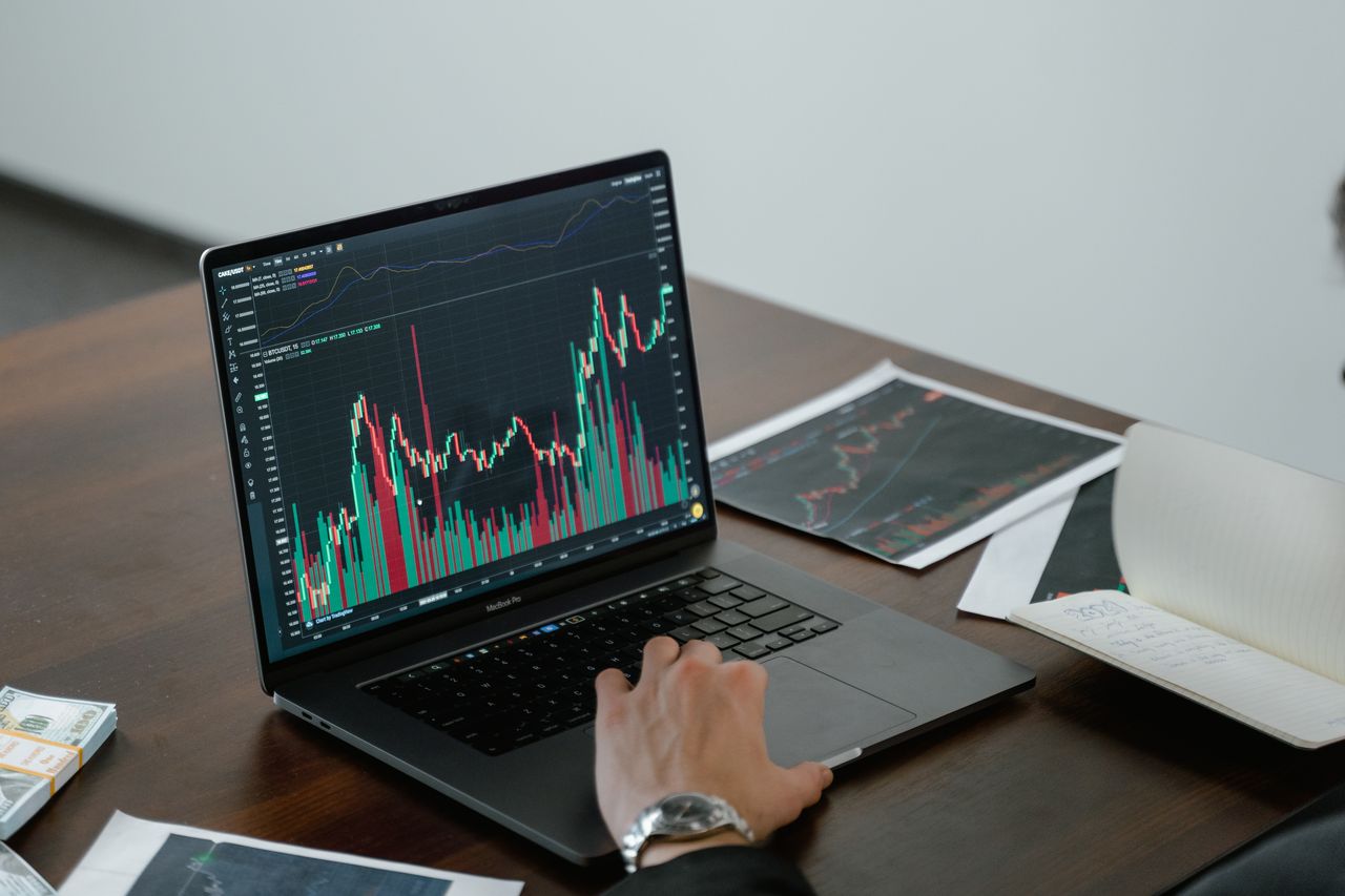 Charts and graphs on a laptop screen, similar to reviewing AWeber analytics and reporting data