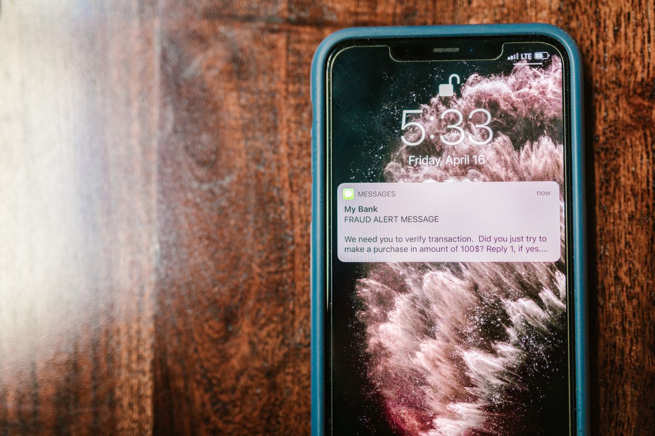 Alert text message on a cellphone, a common start of job scams targeting students seeking online work