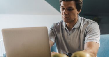 Freelancer using his laptop, one proven way to make real money online